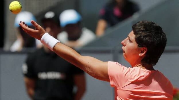 Carla Suárez vence a la fiebre y a Lisicki para repetir en octavos de final