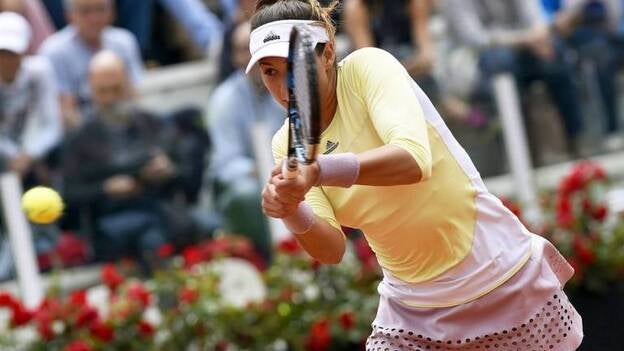 Muguruza vence a Ostapenko y pasa a cuartos; Carla Suárez cae ante Bacsinszky