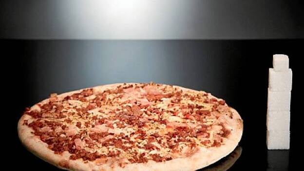 Con la pizza come cuatro terrones