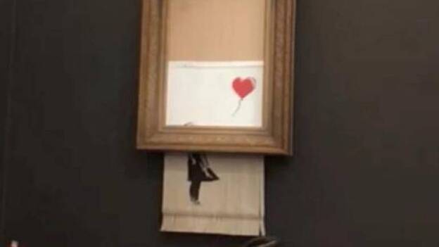 Una obra de Banksy se autodestruye tras subastarse