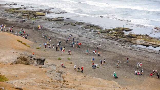 Una playa limpia bien vale un Guinness