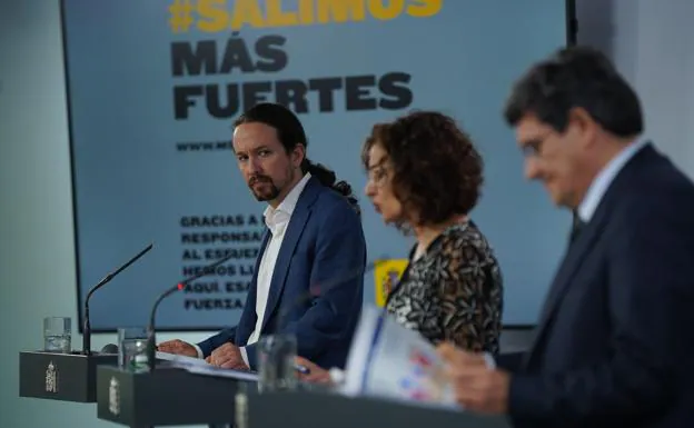 Pablo Iglesias, María Jesús Montero y José Luis Escrivá en la presentación del ingreso mínimo vital, el 31 de mayo /EP