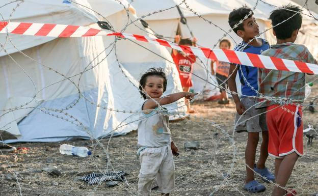 Unos niños en uno de los campos de refugiados./Afp