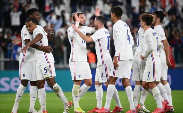 Los jugadores franceses celebran el definitivo 2-3.