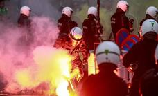 Decenas de detenidos en las protestas por las restricciones en Bélgica y Países Bajos