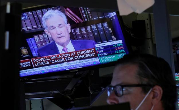 Jerome Powell, chairman of the Fed on screen.